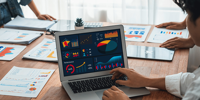 Analyst team utilizing BI Fintech to analyze financial report. Scrutinize