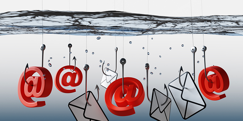 A lot of fishing hooks catching mails and AT symbol of keyboard in clear water