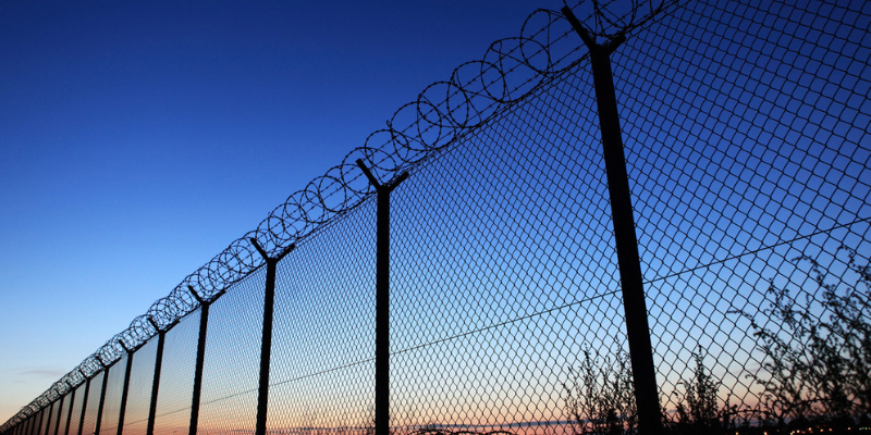 Perimeter fence, illustrating how browser security for businesses helps protect users